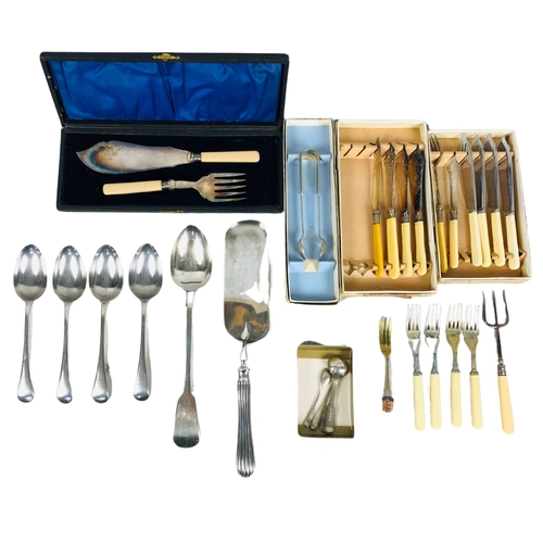 243 - Cutlery for fish course to include servers. Also some Silver Plate serving spoons. Cake slice etc.