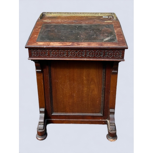 213 - Victorian Davenport Sloping writing desk - with ormolu guard rail and carved frieze below slope.