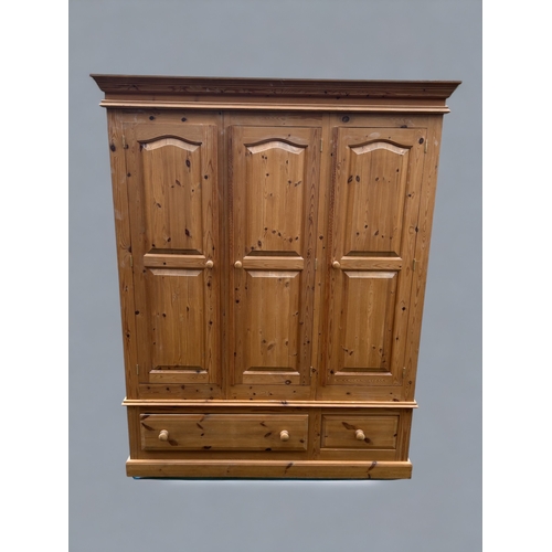 212 - A Large Pine 3 Door Wardrobe over Drawers - Good Condition