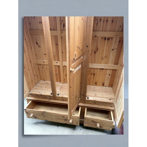 212 - A Large Pine 3 Door Wardrobe over Drawers - Good Condition