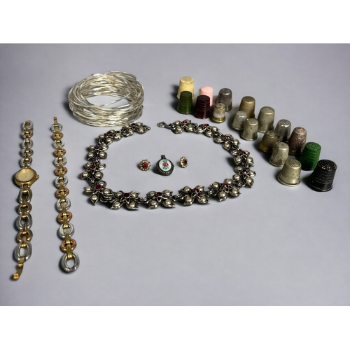 335 - A Large lot of Costume and other Jewelery and Sewing Thimbles. including bangles, watch chains etc