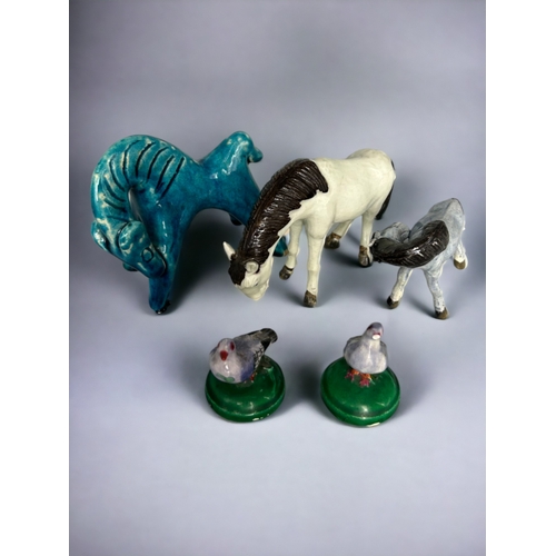 338 - A Large collection of collectables including Chinese Porcelain Horses, Antique figures and Asian col... 