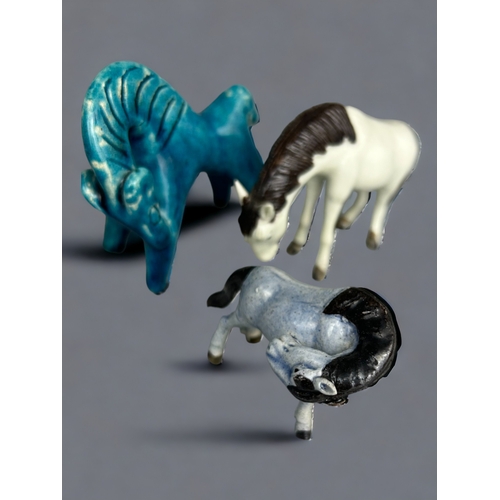 338 - A Large collection of collectables including Chinese Porcelain Horses, Antique figures and Asian col... 