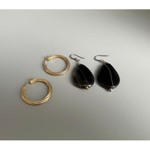 348 - A pair of gold plated ladies hoop earrings, together with a pair of polished stone pair.