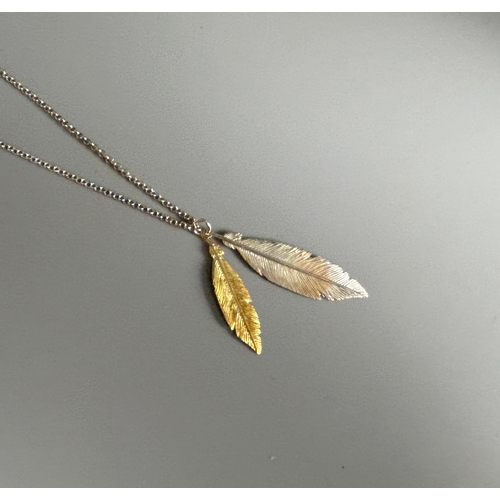 349 - A silver gilt ladies 'Leaf' necklace. Together with a ladies silver ring.