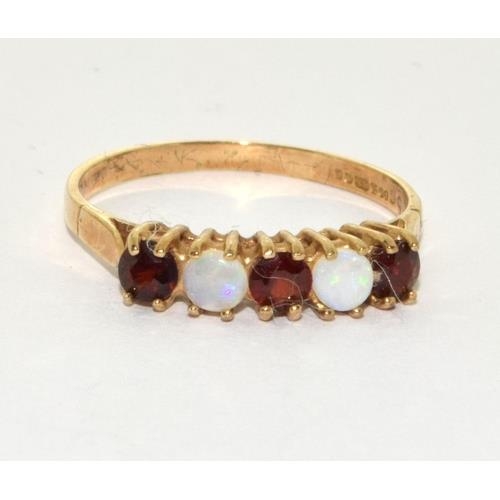 507 - 9ct gold ladies antique set Opal and garnet ring size R