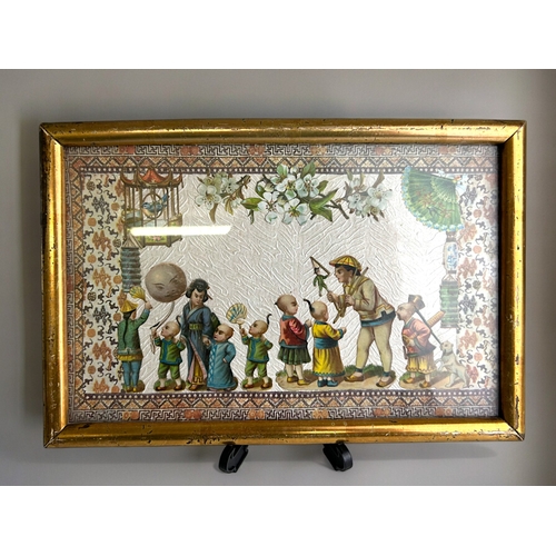 111 - A 19th century Chinoiserie decoupage artwork.Decorated with playing children. In gilt frame.