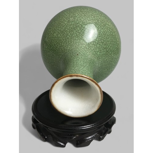 70 - Chinese Crackle Glazed Celadon Green Vase on later Stand.