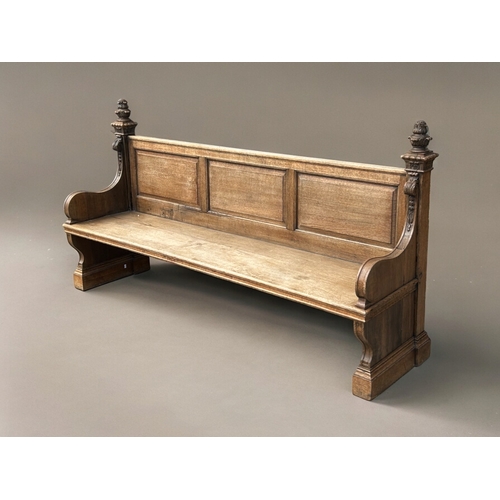 368 - Antique carved Oak church Pew.  Shaped armrests with curved finials.dimensions are 199 x 104 x 56cm... 