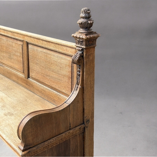 368 - Antique carved Oak church Pew.  Shaped armrests with curved finials.dimensions are 199 x 104 x 56cm... 