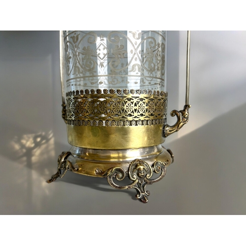 517 - A Victorian silver plate pickle castor. With etched glass liner. Together with a nickel plate on bra... 