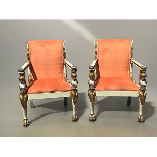 749 - A pair of Italian Neoclassical type armchairs.Early-mid 20th Century.Carved wood painted winged maid... 