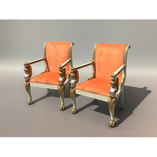 749 - A pair of Italian Neoclassical type armchairs.Early-mid 20th Century.Carved wood painted winged maid... 