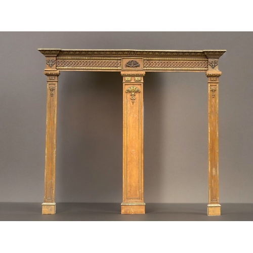 753 - A very large carved wood twin-door surround.Two outer columns with larger central divider. The heade... 