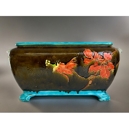 757 - A glazed Faience Majolica planter.French, 19th century.In the style of Theodore Deck.Twin handled wi... 