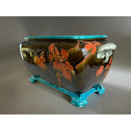 757 - A glazed Faience Majolica planter.French, 19th century.In the style of Theodore Deck.Twin handled wi... 