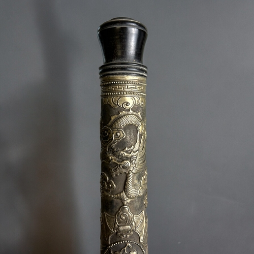 768 - A Chinese Opium pipe.Qing dynasty, 19th century.Elaborately relief decorated with immortal's, Bats, ... 