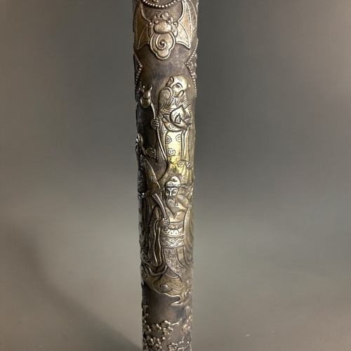 768 - A Chinese Opium pipe.Qing dynasty, 19th century.Elaborately relief decorated with immortal's, Bats, ... 