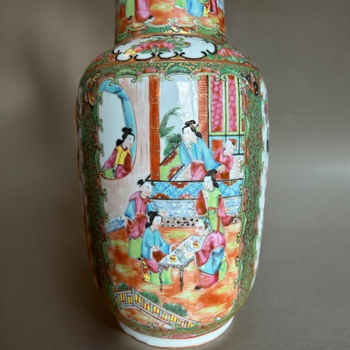 769 - A large Chinese Canton porcelain vase.Qing dynasty, 19th century.Hand painted court scenes, bordered... 