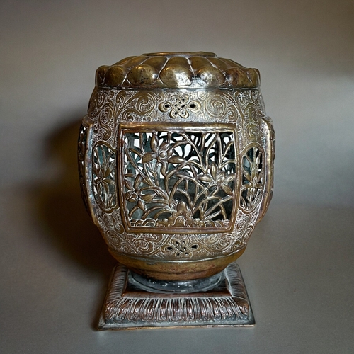 773 - A Chinese patinated brass lantern.Qing dynasty, 19th century.Barrell form, reticulated with foliate ... 