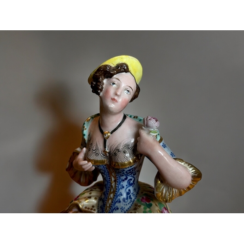 779 - A Jacob Petit porcelain penholder figure.Paris, 19th century.Polychrome painted. Marked to base.... 