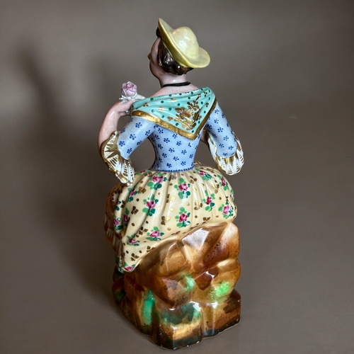 779 - A Jacob Petit porcelain penholder figure.Paris, 19th century.Polychrome painted. Marked to base.... 