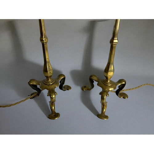 782 - A pair of Arts & Crafts brass table lamps.Unsigned, attributed to W.A.S Benson.With white glass ... 