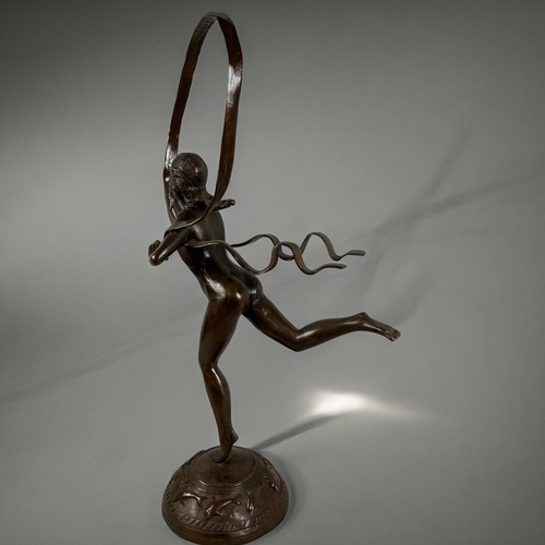 785 - A large Bronze 'Hoop' sculpture.After Paul Manship, American (1885 –1966).Height - 93cm