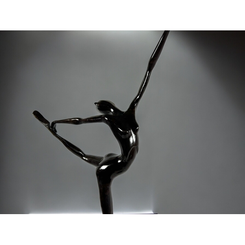 787 - A large Bronze abstract 'Dancer' sculpture.20th Century.Raised on stepped marble base.Height - 117cm... 