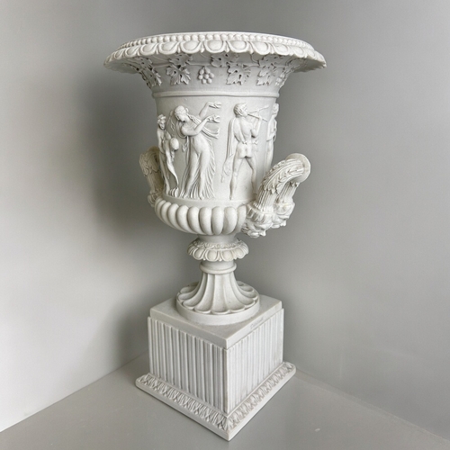 790 - A pair of Neo classical Medici campana urns.20th Century.Composite marble. Height - 34cm... 