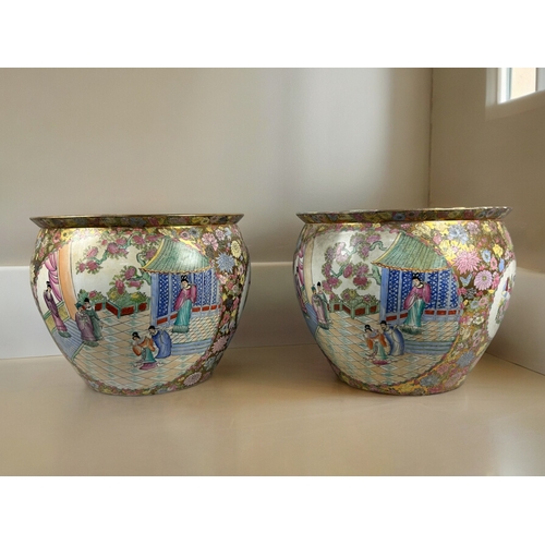 791 - A very large pair of Chinese 'Canton' porcelain fish bowls.Hand painted court scenes, with floral bo... 