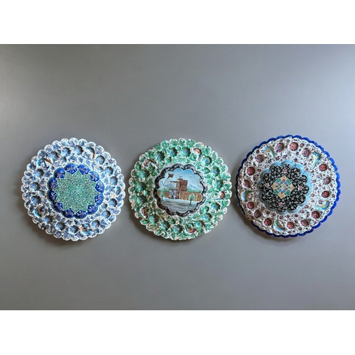 794 - Three antique Persian Minakari enamel plates.Diameter - 24cm