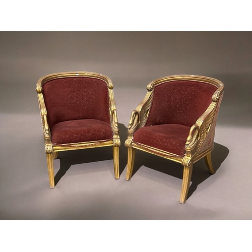 799 - A pair of vintage French Empire style 'Swan' Bergère armchairs.Upholstered tub form, with carved &am... 