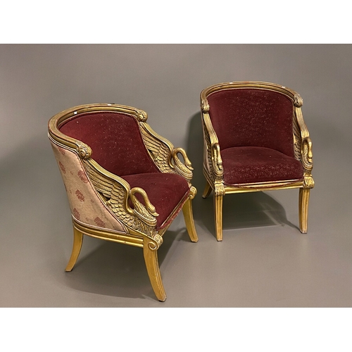 799 - A pair of vintage French Empire style 'Swan' Bergère armchairs.Upholstered tub form, with carved &am... 