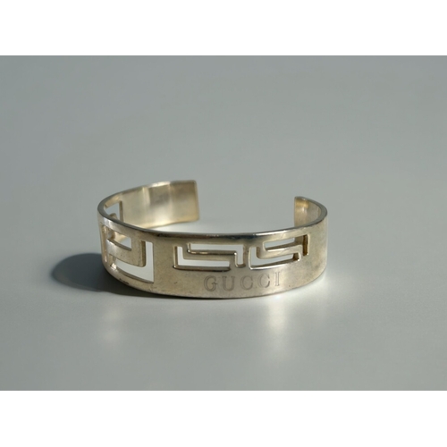 420 - A sterling silver 'Greek key' pattern cuff bracelet.