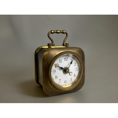 203 - A Blue glass Art Deco desk clock. Together with a French brass travel clock.Glass clock height - 8cm... 