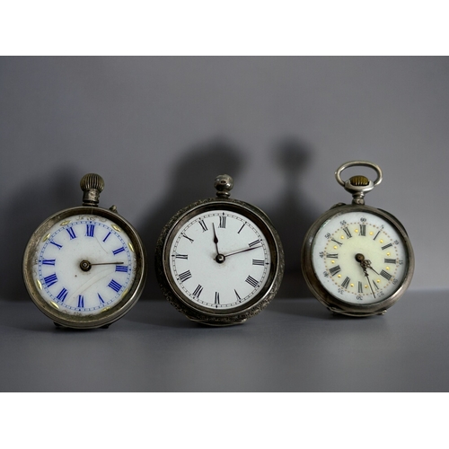 424 - A Collection of four antique sterling silver engraved pocket watches.