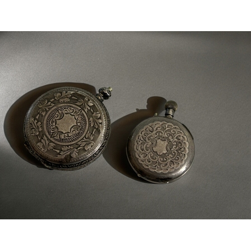 424 - A Collection of four antique sterling silver engraved pocket watches.