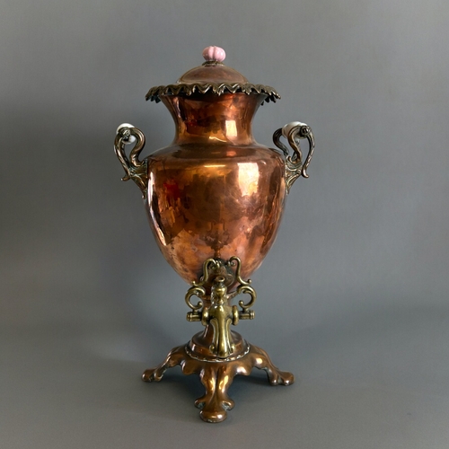 120 - A large Victorian Copper & Brass samovar.With ceramic handles and stylised brass tap.Height - 50... 