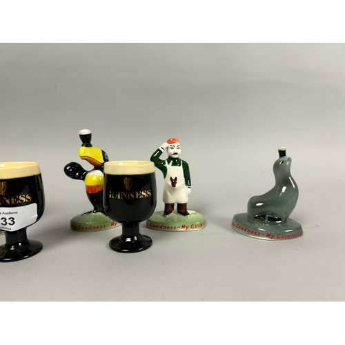 109 - A collection of Carlton Ware 'Guinness' egg cups and Guinness style figurines.To include - Ostrich, ... 