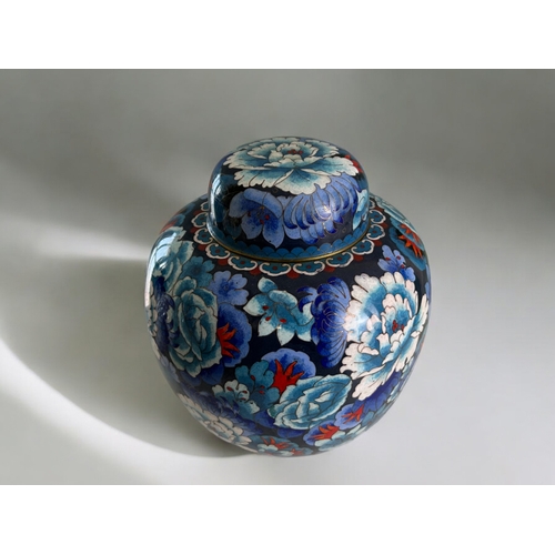 97 - A large Chinese Cloisonné lidded jar.Mid, 20th century.  Depicting blossoming flowers. Marked to bas... 