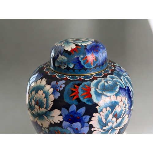 97 - A large Chinese Cloisonné lidded jar.Mid, 20th century.  Depicting blossoming flowers. Marked to bas... 