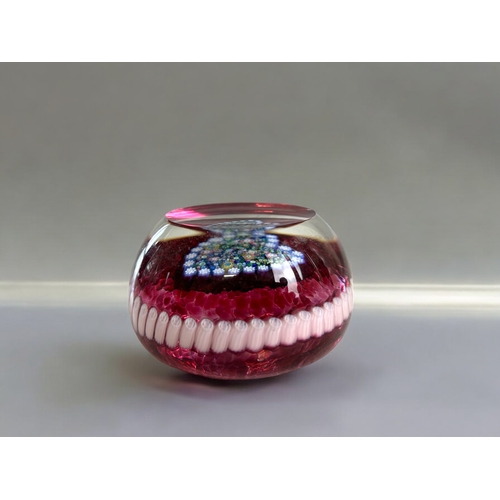 114 - A vintage Perthshire glass 'Heart' paperweight.Close pack Millefiori heart pattern.7 x 4cm... 