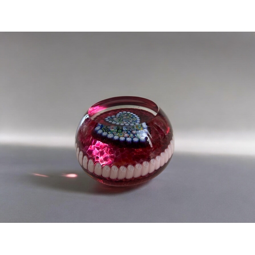 114 - A vintage Perthshire glass 'Heart' paperweight.Close pack Millefiori heart pattern.7 x 4cm... 