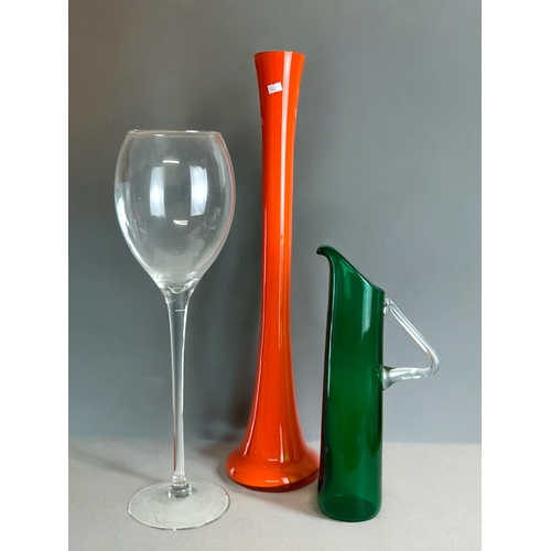 115 - A collection of oversized art glass. Including large 'wine glass' vase, hand made orange vase by LSA... 