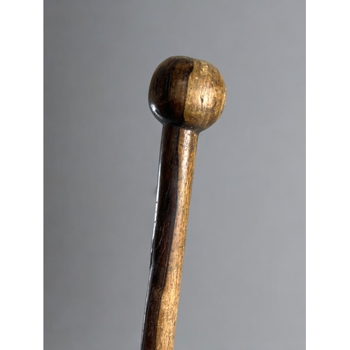 454 - An African tribal hardwood Knobkerrie.Late 19th-20th century. Length - 53cm