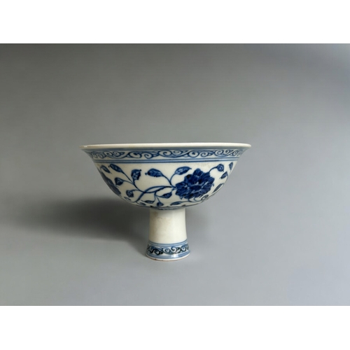 88 - A large Chinese blue & white porcelain stem cup.In the Ming style. Underglaze blue band of scrol... 