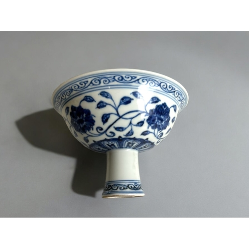 88 - A large Chinese blue & white porcelain stem cup.In the Ming style. Underglaze blue band of scrol... 