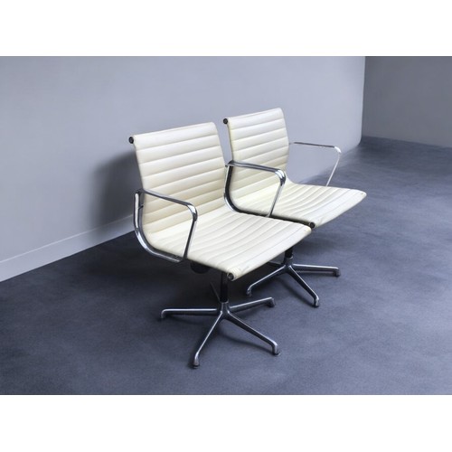 315 - Charles Eames - Pair of Mid Century Leather and Chromed Steel Office Chairs.