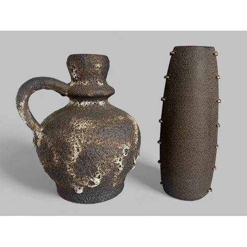 398 - A large Werst German 'Fat lava' jug shape vase. Attributed to Ruscha. Together with another vase.